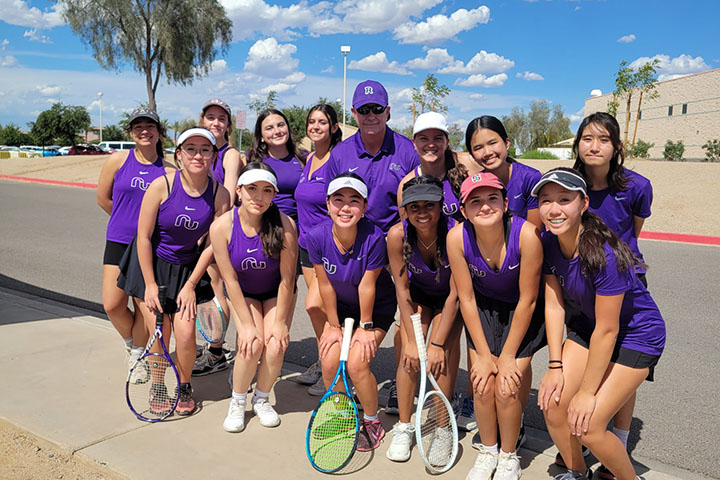The girls tennis team poses for a group photo