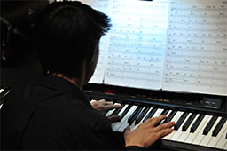 Student playing the keyboard